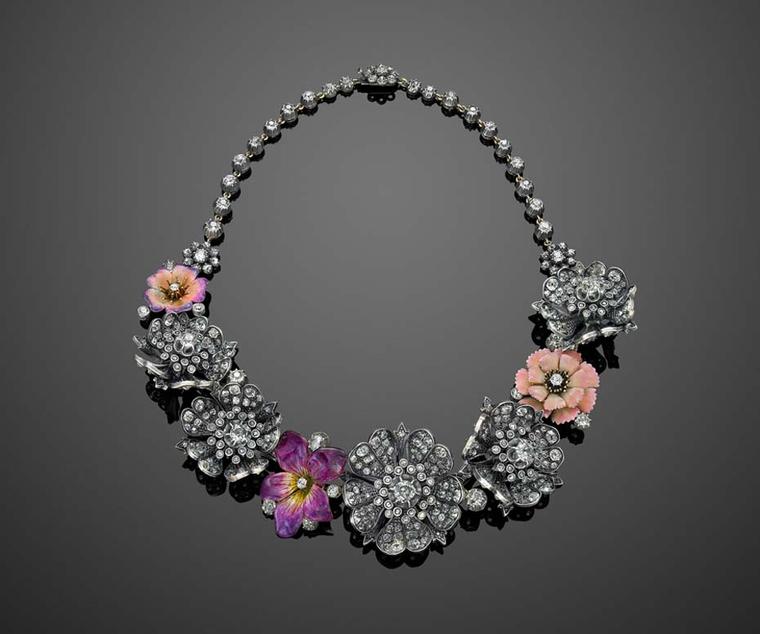 This stunning vintage necklace was worn by Nicole Kidman to the 2010 SAG Awards. Re-imagined by Fred Leighton, it features three 19th century pink and purple enamel flowers nestling between antique old-mine diamond flowers in their original, circa 1880s, 